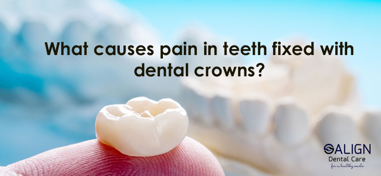 What causes pain in teeth fixed with dental crowns
